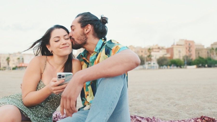 couple sitting on the beach