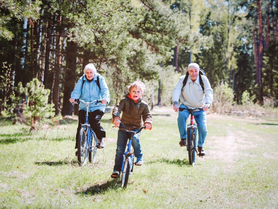 Grandparents and grandchild riding bikes